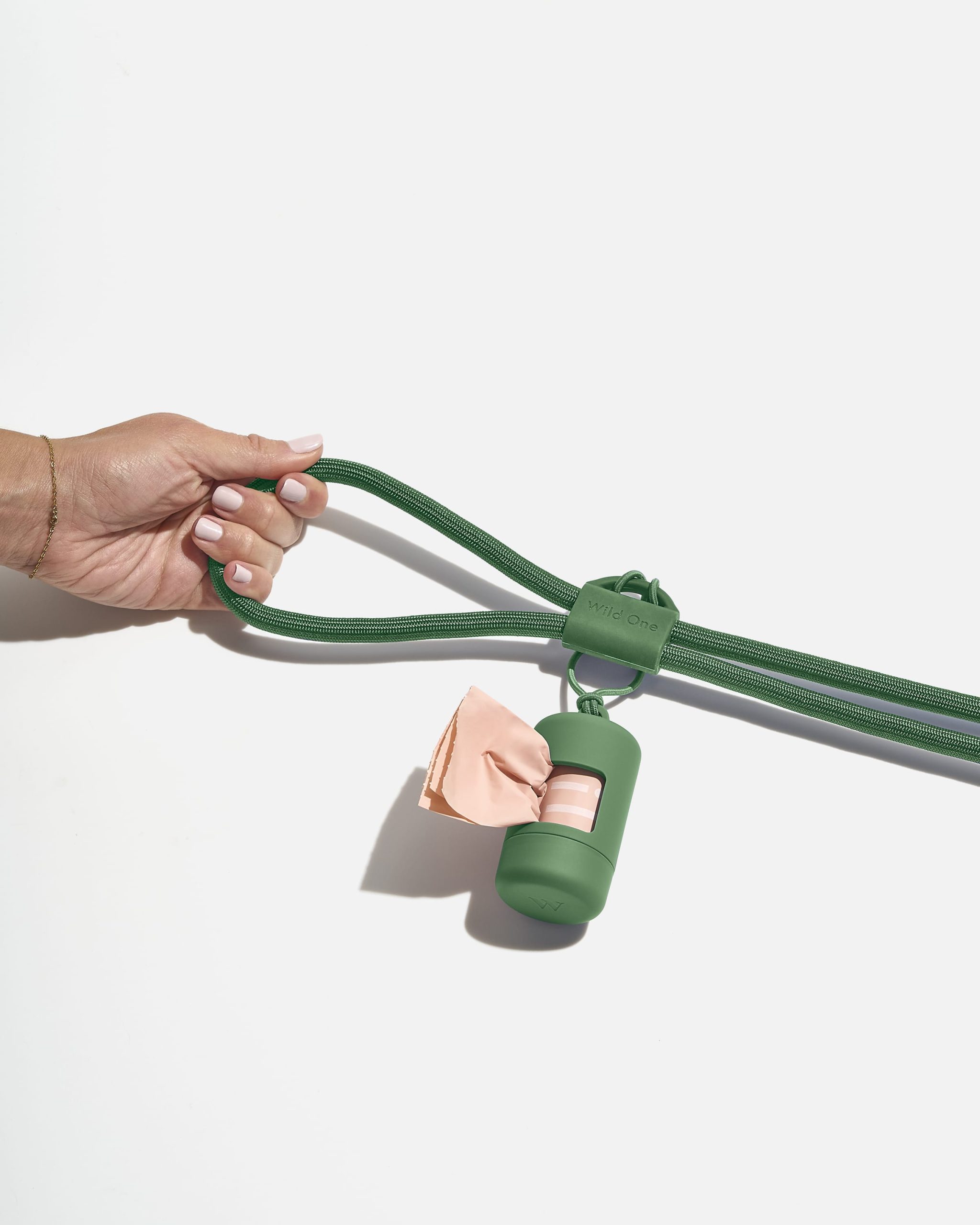 WO_VM_RopeLeash_PoopBagCarrier_Spruce_PDP_01_4x5_Web_ca737093-3a41-4e13-9788-4d02c89245eb.jpg